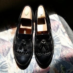 Ferragamo black leather tassel loafers